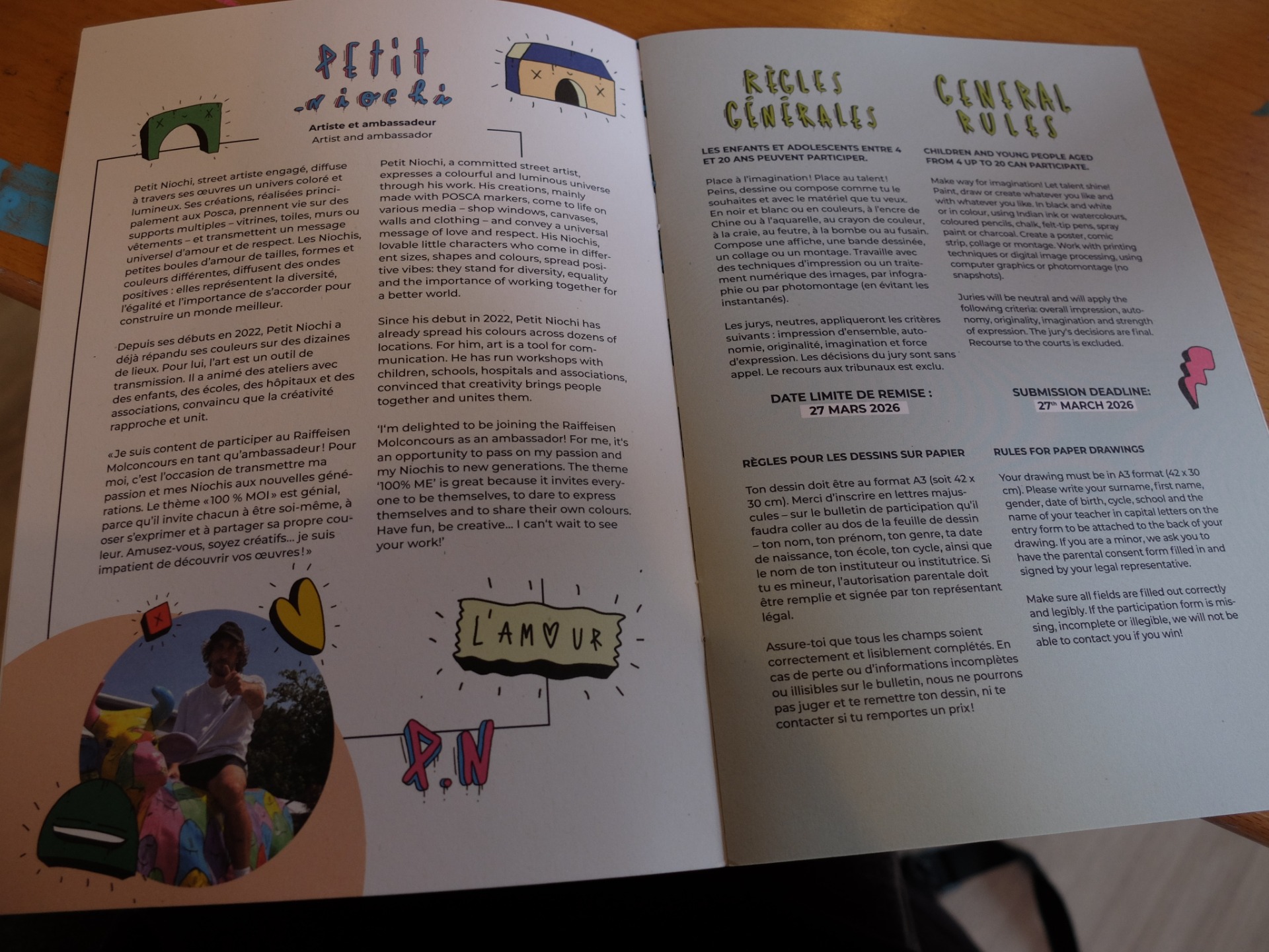 JB est ambassadeur d'un concours de dessin organisé par la banque luxembourgeoise Raiffeisen. Il gère entre autre la chartre graphique et fait parti du jury 